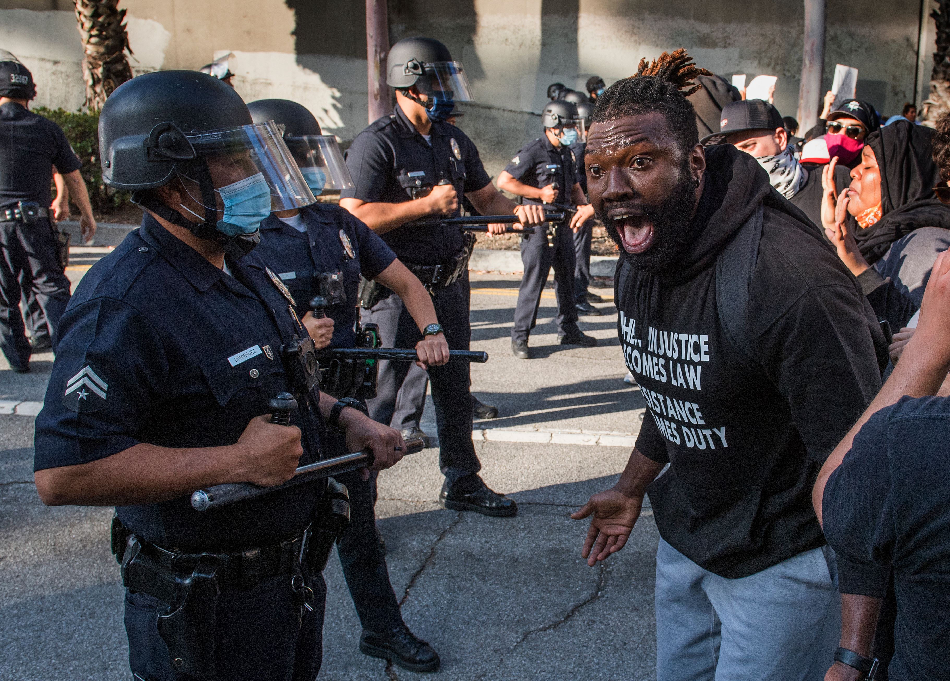 LAPD Declares Unlawful Assembly As Protesters, Police Clash Downtown;  Looting Reported – CBS Los Angeles