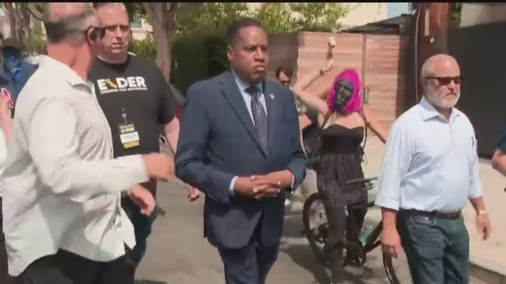 Protester Wearing Gorilla Mask Throws Egg At Recall Candidate Larry Elder; Venice Tour Cut Short
