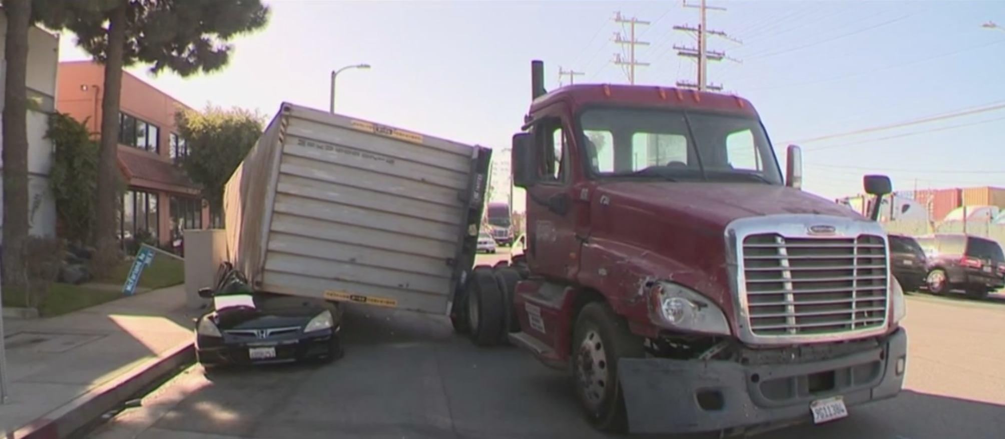 Police Patrolling Big Rig Traffic In Wilmington Neighborhood After Shipping Container Crushes Car